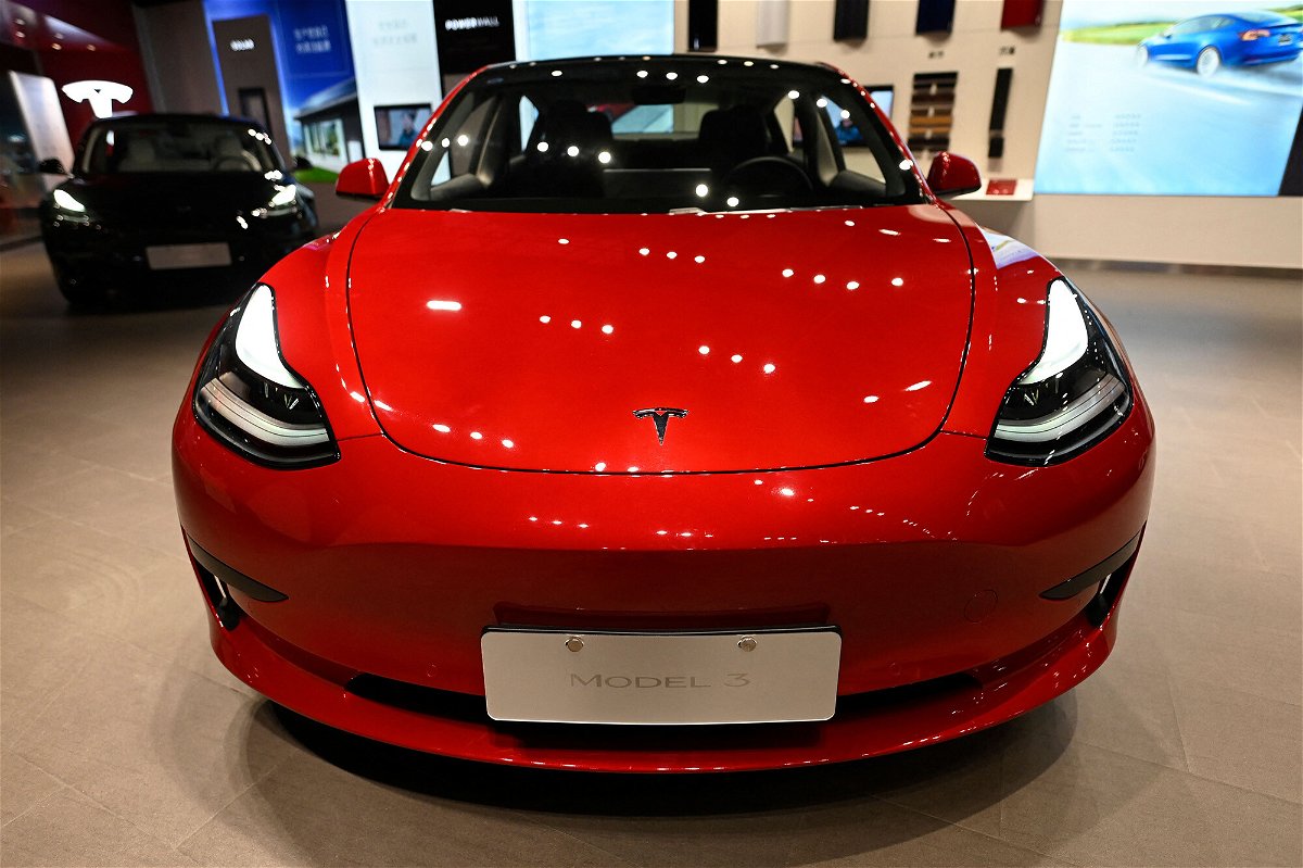 <i>Jade Gao/AFP/Getty Images</i><br/>Tesla recalls 1.1 million cars for windows that can 'pinch occupants while closing.