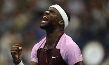 Frances Tiafoe reacts during his 2022 US Open Tennis tournament Round of 16 match against Spain's Rafael Nadal.