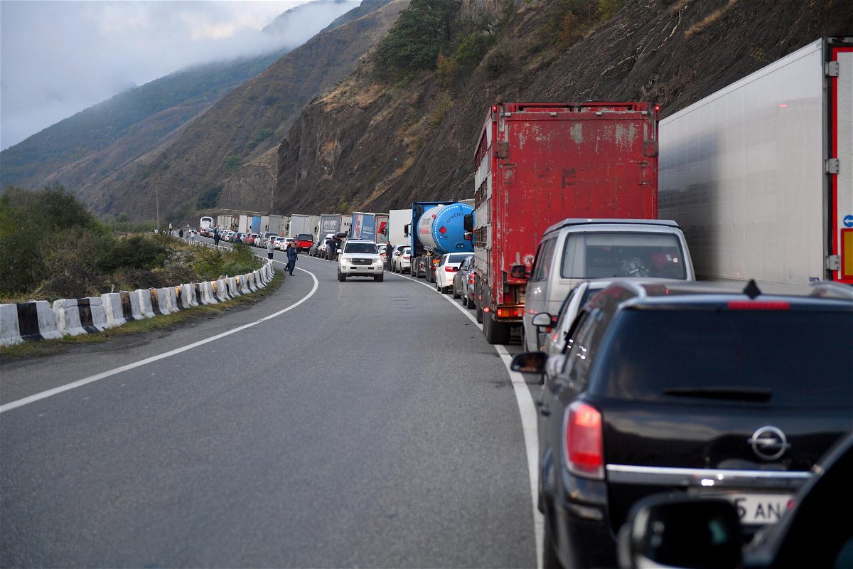 <i>Emin Dzhafarov/Kommersant/Sipa USA</i><br/>The situation at a border and customs checkpoint shows a line of cars on the road on Friday in North Ossetia
