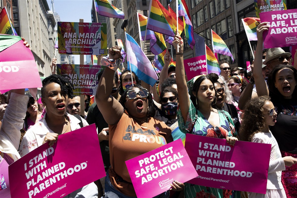 <i>Andrew Lichtenstein/Corbis News/Getty Images</i><br/>Planned Parenthood leads a Pride march in New York after the Supreme Court's decision to overturn Roe v. Wade.
