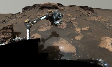 Perseverance uses its robotic arm to work around a rocky outcrop called Skinner Ridge.