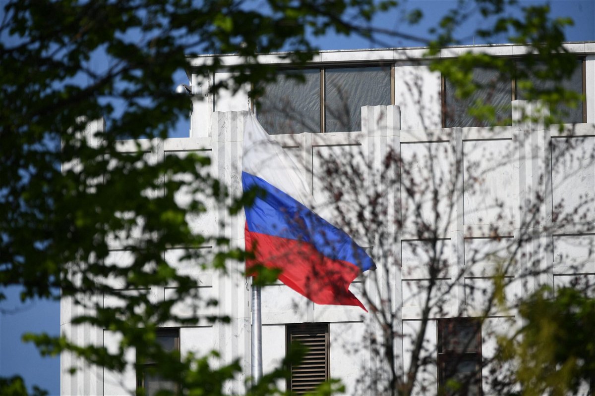 <i>MANDEL NGAN/AFP/Getty Images</i><br/>The Russian flag flies at the embassy's compound in Washington on April 15