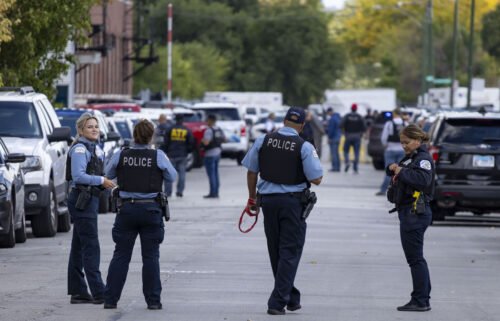 Chicago police are seen here investigating a shooting at the Homan Square police facility on September 26