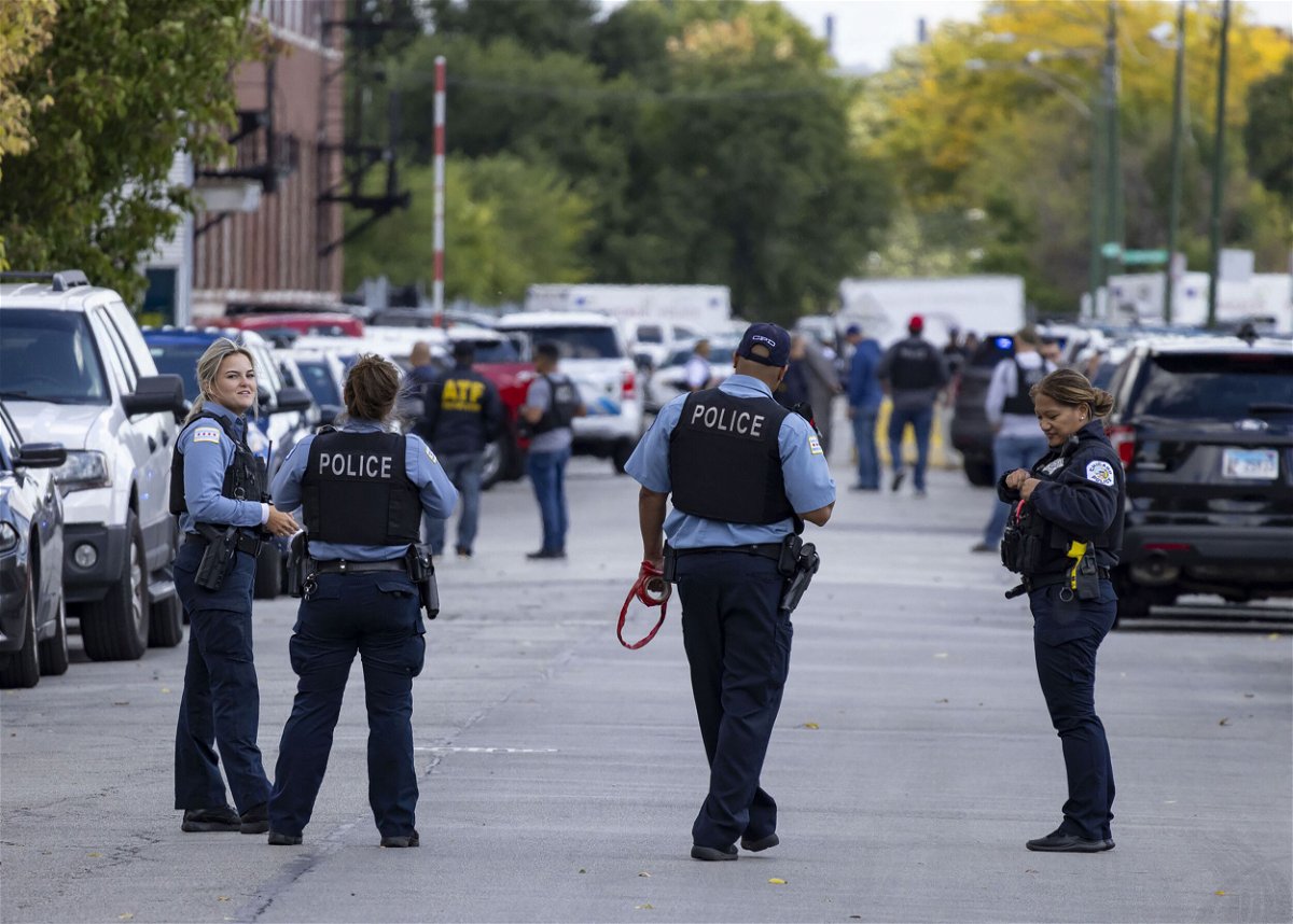 <i>Brian Cassella/Chicago Tribune/TNS/Getty Images</i><br/>Chicago police are seen here investigating a shooting at the Homan Square police facility on September 26