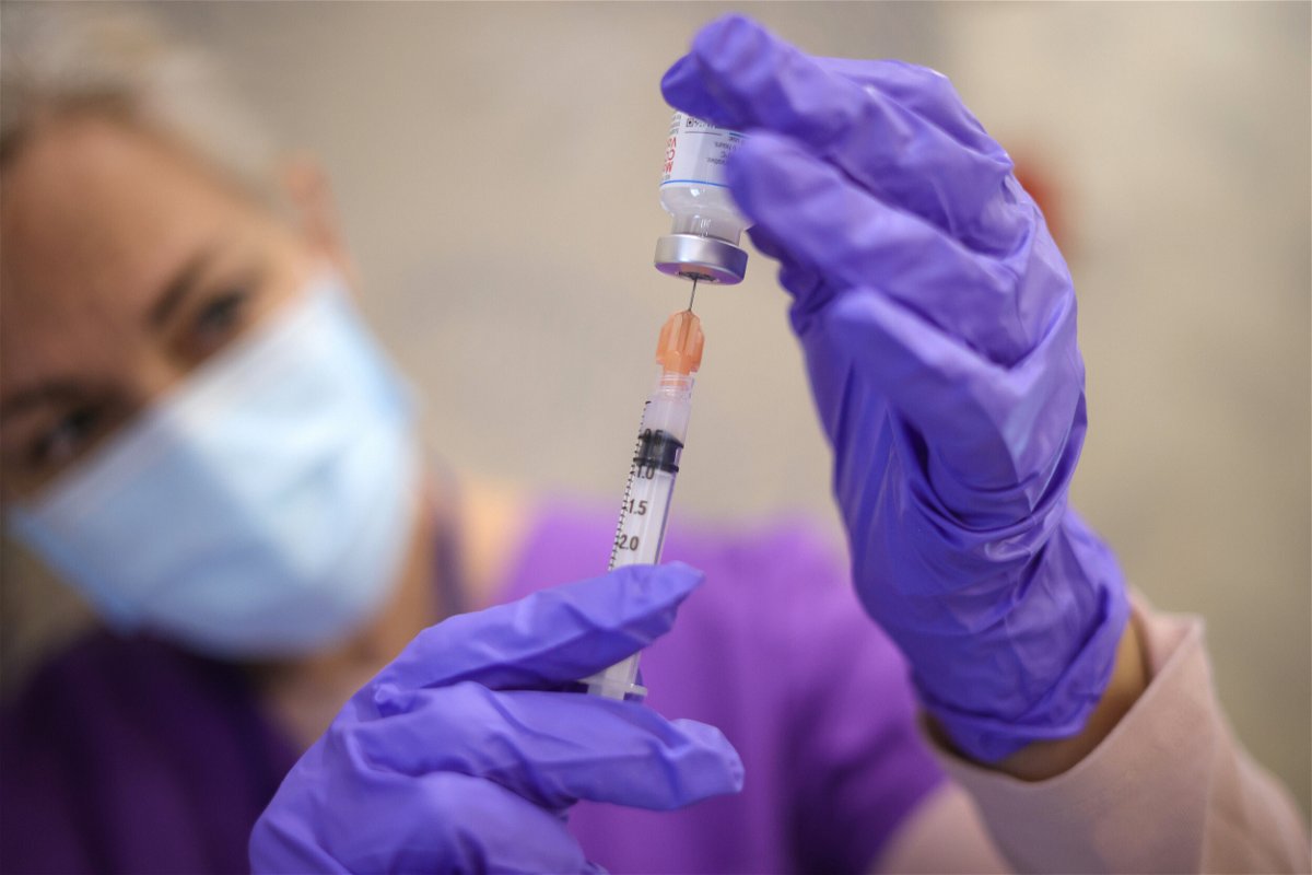 <i>Win McNamee/Getty Images</i><br/>A nurse draws vaccine doses from a vial in Bowie