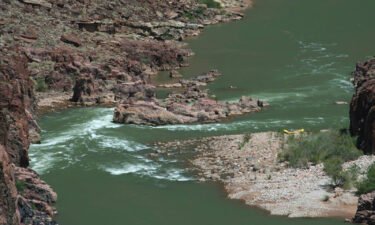Bedrock Rapids is pictured here where the Colorado River is divided in two.