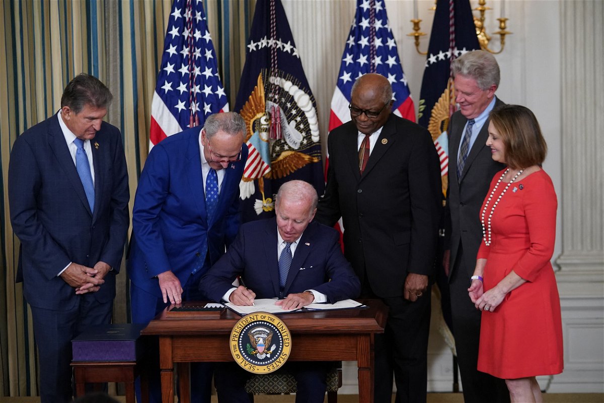 <i>Mandel Ngan/AFP/Getty Images</i><br/>How a simple philosophy helped lead to a White House celebration. US President Joe Biden is pictured here signing the Inflation Reduction Act of 2022 into law during a ceremony at the White House in Washington