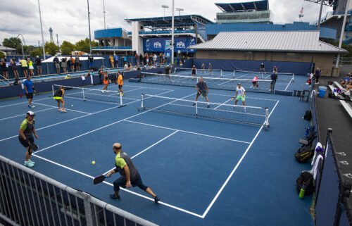 Amateur pickleball players play mixed double matches during the Professional Pickleball Association Baird Wealth Management Open.