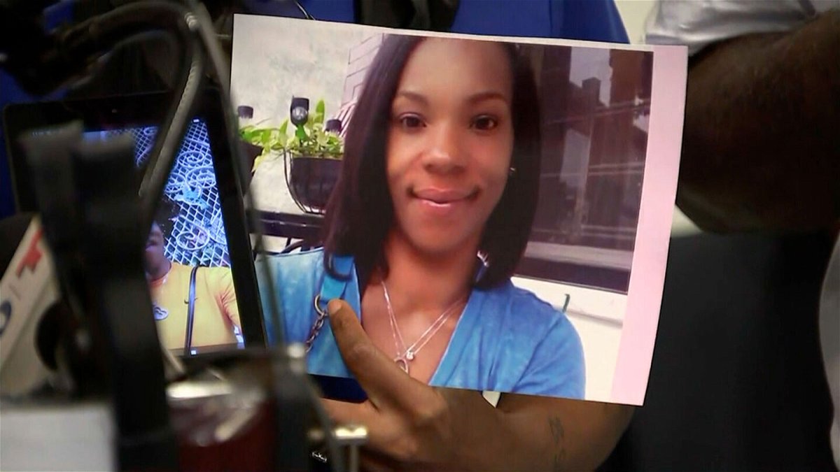<i>Family photo/KYW</i><br/>A family member holds an image of Tiffany Fletcher at a news conference on September 12. A 14-year-old boy has been charged with murder in connection with the shooting death of Fletcher.