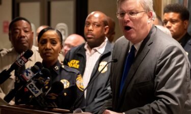 Memphis Mayor Jim Strickland (right) speaks during a press conference on September 8.
