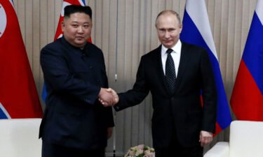 Russian President Vladimir Putin greets North Korean Leader Kim Jong Un during their meeting in April of 2019 in Vladivostok