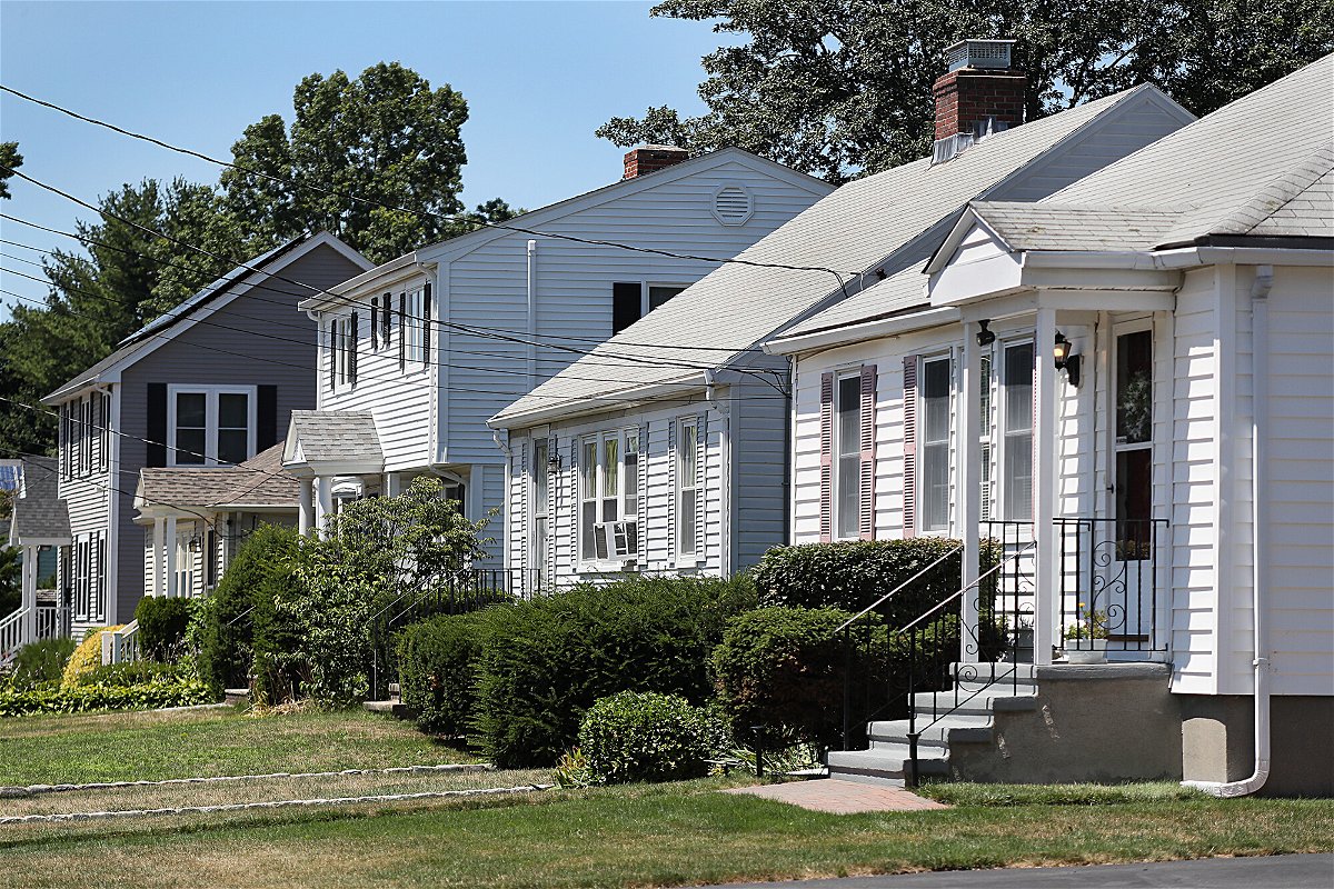 <i>Suzanne Kreiter/The Boston Globe/Getty Images</i><br/>Single family homes are pictured on Colonial Drive in Arlington