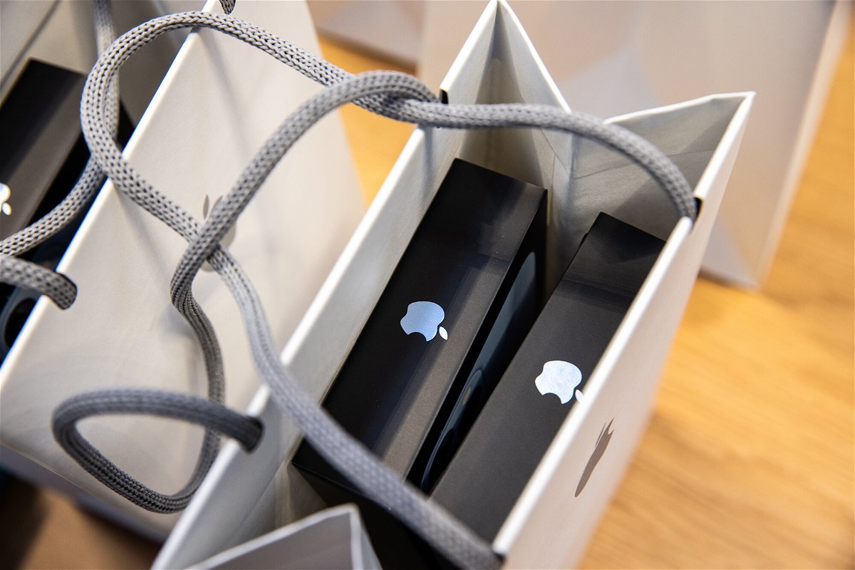 <i>Jeenah Moon/Bloomberg/Getty Images</i><br/>New Apple iPhones are set to be revealed on September 7. Apple iPhone 13 Pro phones are pictured inside a shopping bag at an Apple store in New York in 2021.