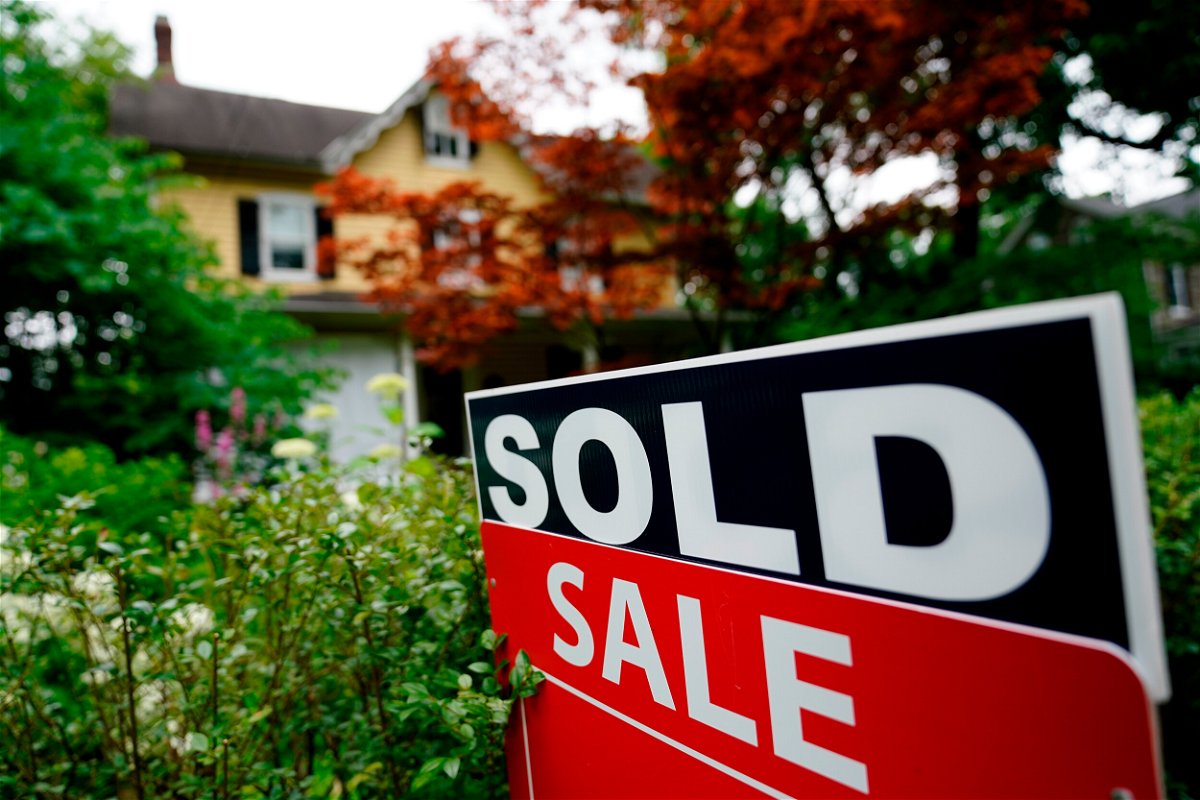 <i>Matt Rourke/AP/FILE</i><br/>Home sales declined for the seventh month in a row in August as higher mortgage rates and stubbornly high prices pushed prospective buyers out of the market. A sale sign stands outside a home in Wyndmoor