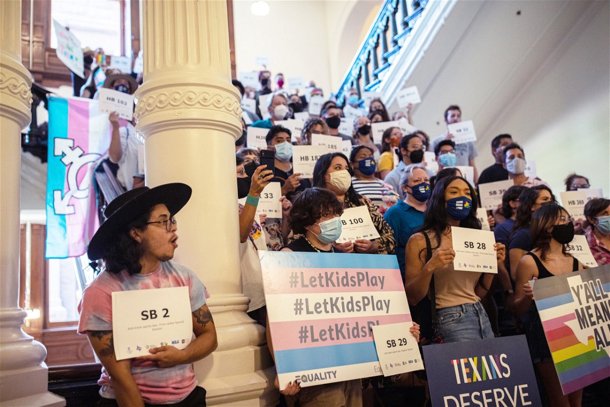 <i>Tamir Kalifa/Getty Images</i><br/>LGBTQ rights supporters are seen here at the Texas State Capitol tin September 2021. Texas' family services are 'on the brink of collapse' following the state's decision to investigate the gender-affirming care of minors as potential child abuse.