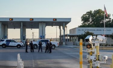 US Customs and Border Protection agents guard the entrance to the Del Rio International Bridge at the US-Mexico border in Del Rio