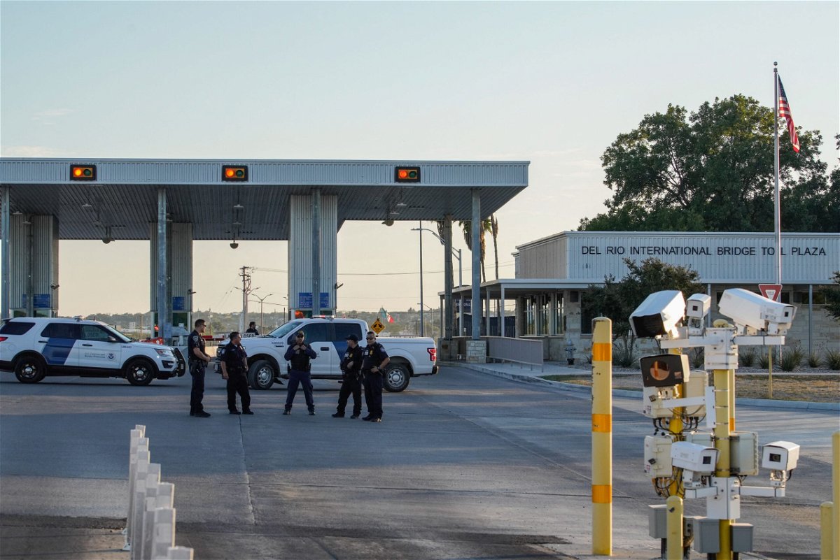 <i>Paul Ratje/AFP/Getty Images</i><br/>US Customs and Border Protection agents guard the entrance to the Del Rio International Bridge at the US-Mexico border in Del Rio