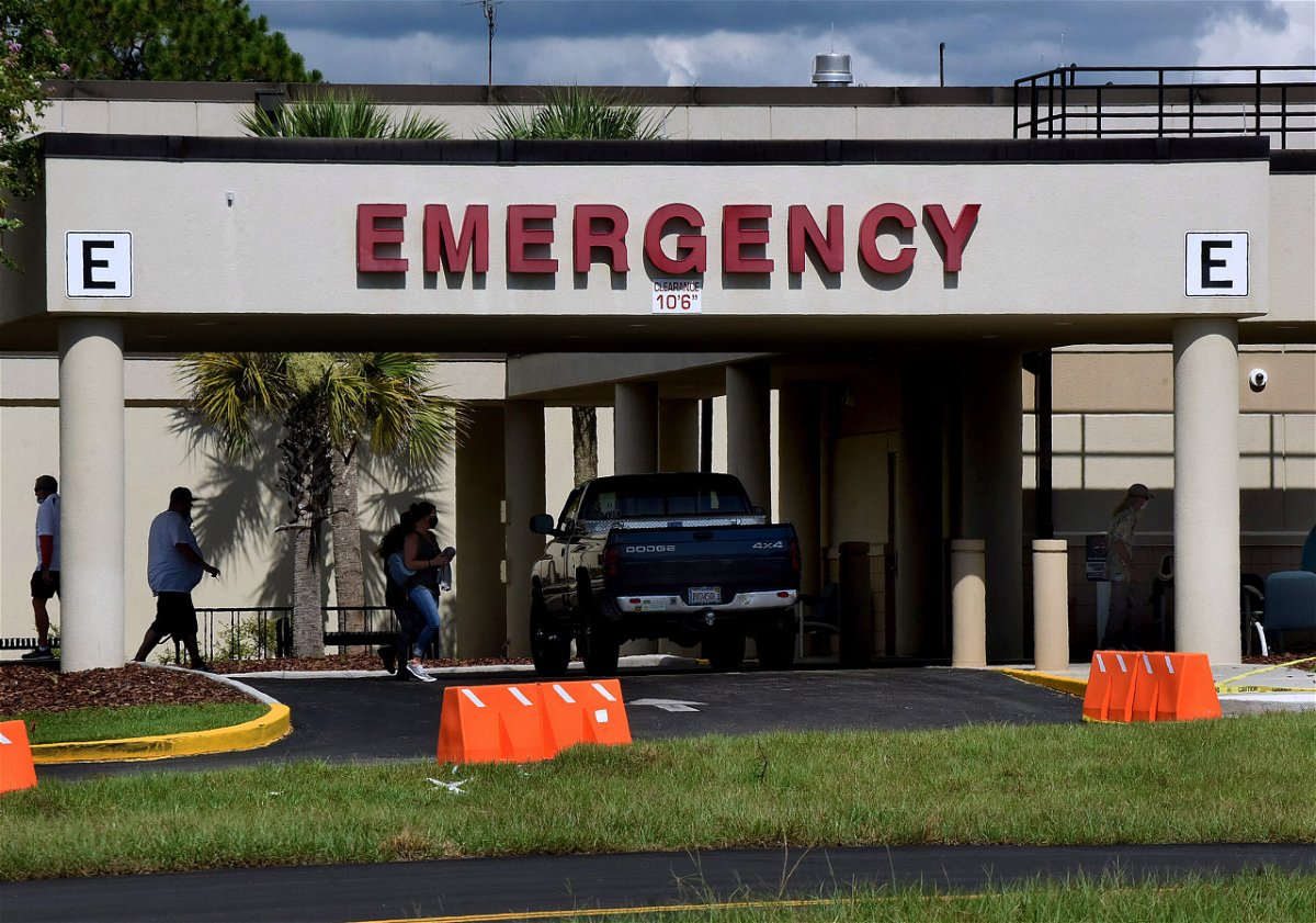 <i>Paul Hennessy/SOPA/LightRocket/Getty Images</i><br/>People are seen outside the entrance to the emergency room at Oak Hill Hospital in Hernando County. Survivors of sexual assault who are treated at emergency departments may be billed thousands of dollars for their care if they are uninsured