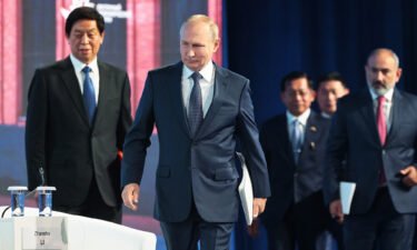 Moscow is playing up Beijing's support for its invasion of Ukraine ahead of a meeting between Russian President Vladimir Putin and Chinese leader Xi Jinping. Putin (center) and Chairman of National People's Congress Li Zhanshu (left) are seen in Vladivostok