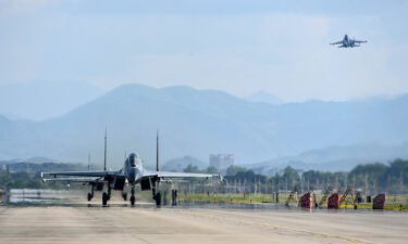 UK warns China is recruiting British pilots to train its military. Fighter jets from the air force and naval aviation corps of the Chinese military are here pictured in Nanjing in August 2022.