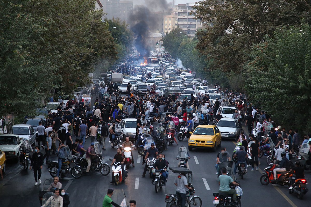 <i>AFP/Getty Images</i><br/>Iranian demonstrators take to the streets of Tehran on September 21 during a protest for Mahsa Amini