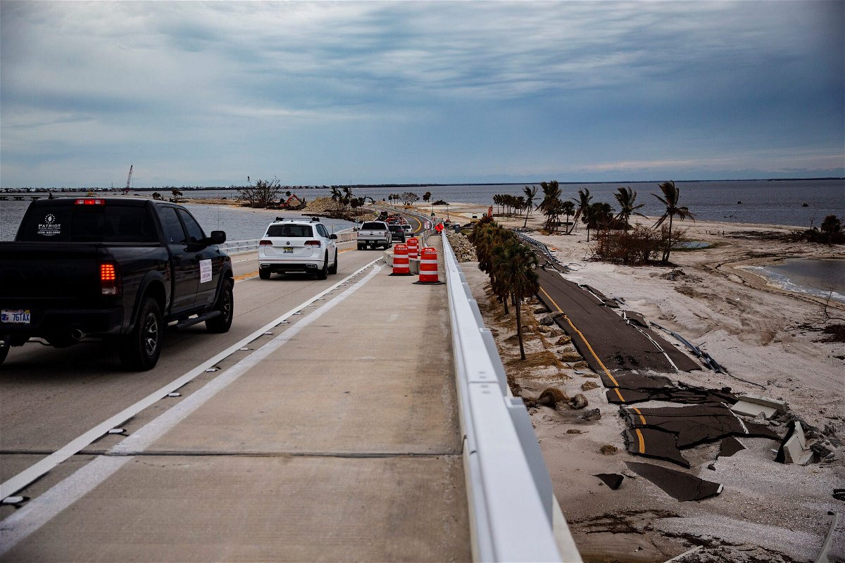 <i>Andrew West/The News-Press/USA Today</i><br/>Sanibel Island residents were crossing the causeway for the first time since Hurricane Ian damaged the only road onto the popular Gulf Coast destination.