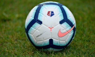 A soccer ball sits on the grass field during the National Women's Soccer League (NWSL) game between the North Carolina Courage and Washington Spirit on June 29