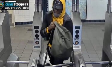 Police release video of the man seen pushing a subway commuter from the platform onto the train tracks in Brooklyn on Friday.