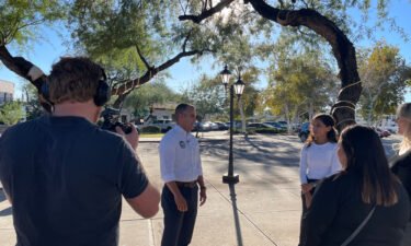 Ciscomani talks to voters in Tucson on October 25.
