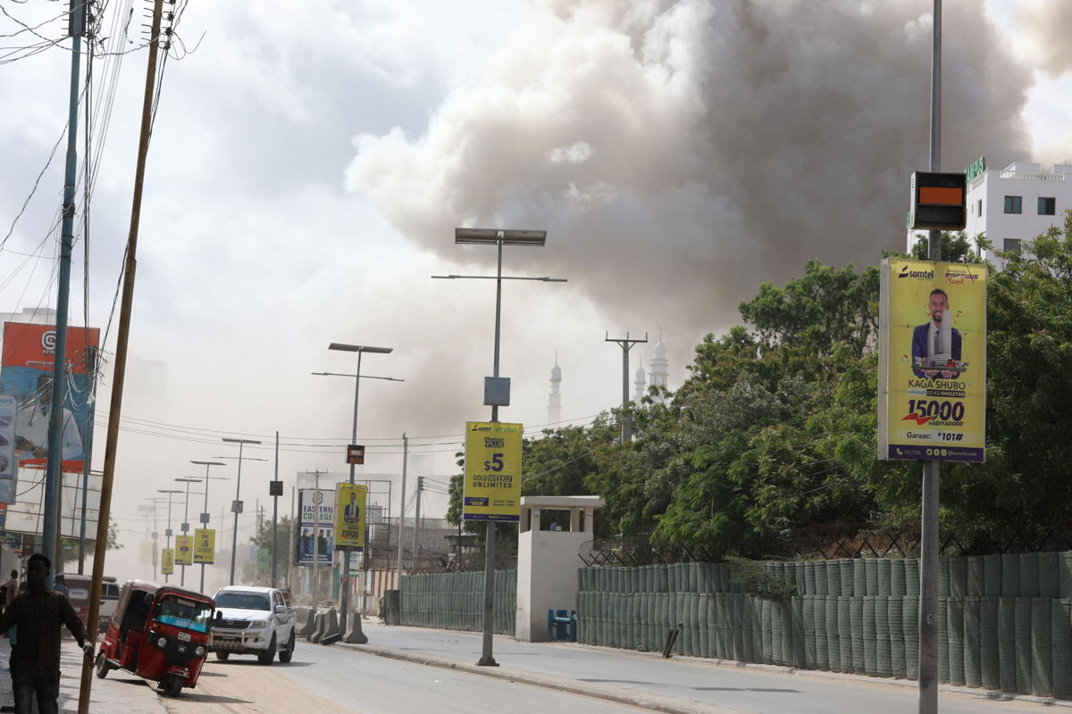 <i>Hassan Ali Elmi/AFP/Getty Images</i><br/>Smoke rises over Mogadishu after a large explosion near the education ministry in Mogadishu on October 29.