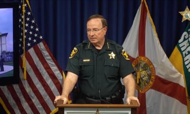 Polk County Sheriff Grady Judd speaks during a news conference about a father and son arrested for attempted murder after allegedly opening fire on a woman sitting in her car.