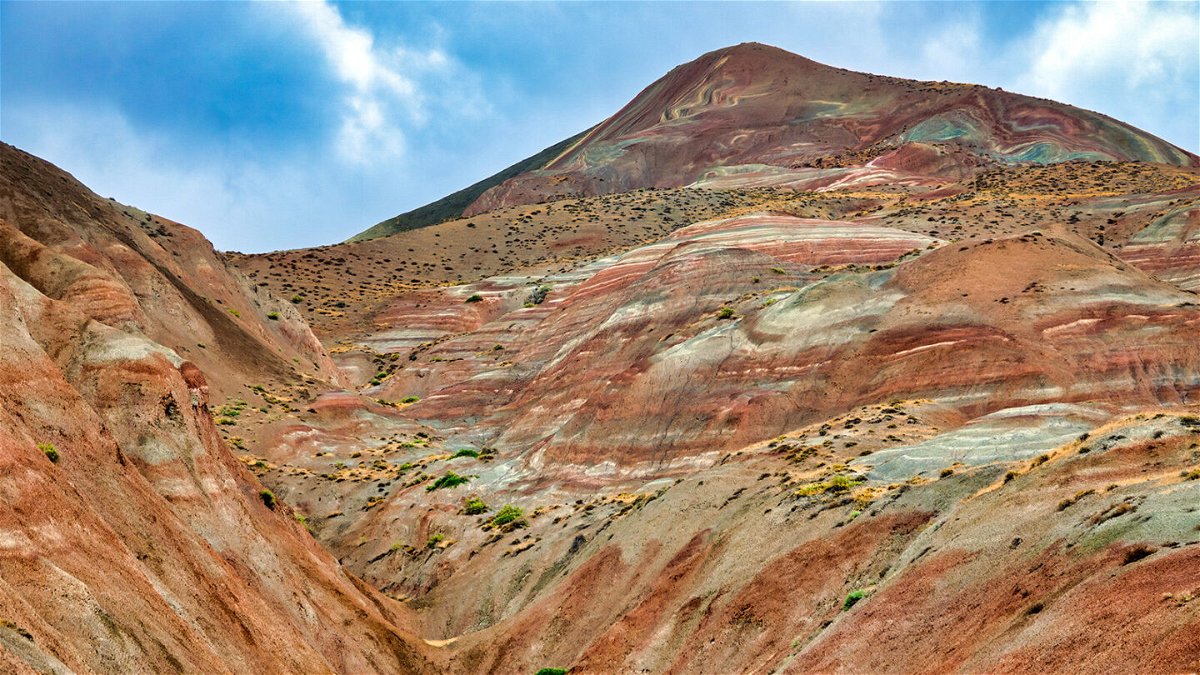<i>only_fabrizio/iStockphoto/Getty Images</i><br/>The mountains' colors are produced by groundwater that have altered the oxidation state of the iron compounds in the earth.