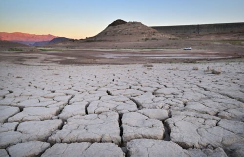 The past three years have been the driest such period on record in California. A vehicle is pictured here driving past a dry
