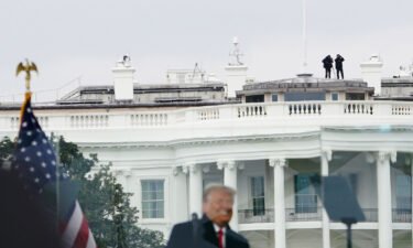 Members of the Secret Service patrol from the roof of the White House as former President Donald Trump speaks on January 6