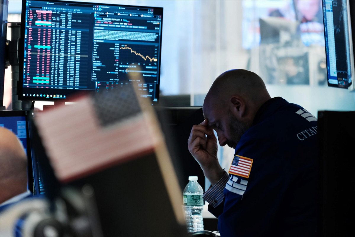 <i>Spencer Platt/Getty Images</i><br/>Traders work on the floor of the New York Stock Exchange on June 10