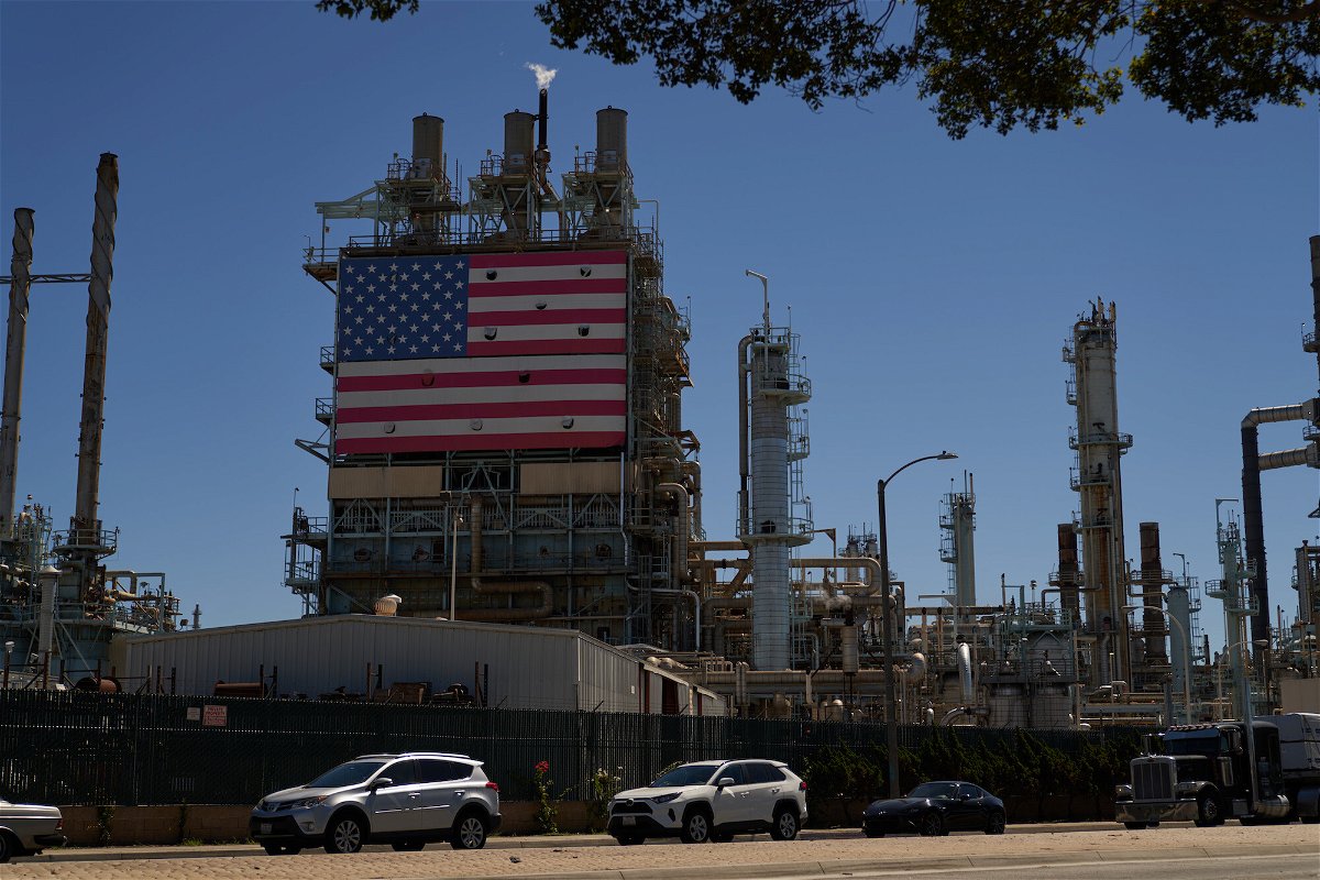 <i>Allison Dinner/Getty Images</i><br/>An oil refinery displays an American flag on September 21 in Wilmington