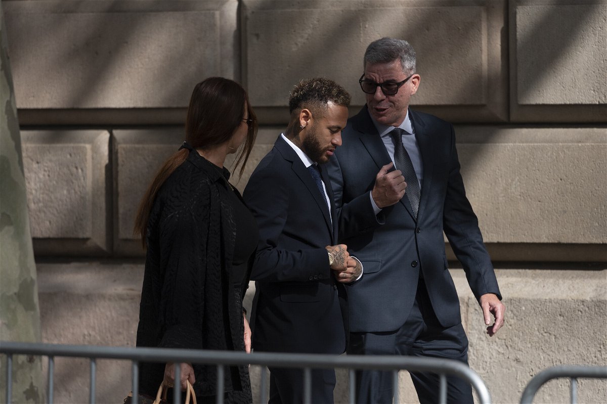 <i>Adria Puig/Anadolu Agency/Getty Images</i><br/>Paris Saint-Germain's Brazilian forward Neymar leaves to the courthouse in Barcelona on October 18