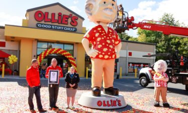 Bargain retailer Ollie’s says it broke a world record with a 16.5 foot tall