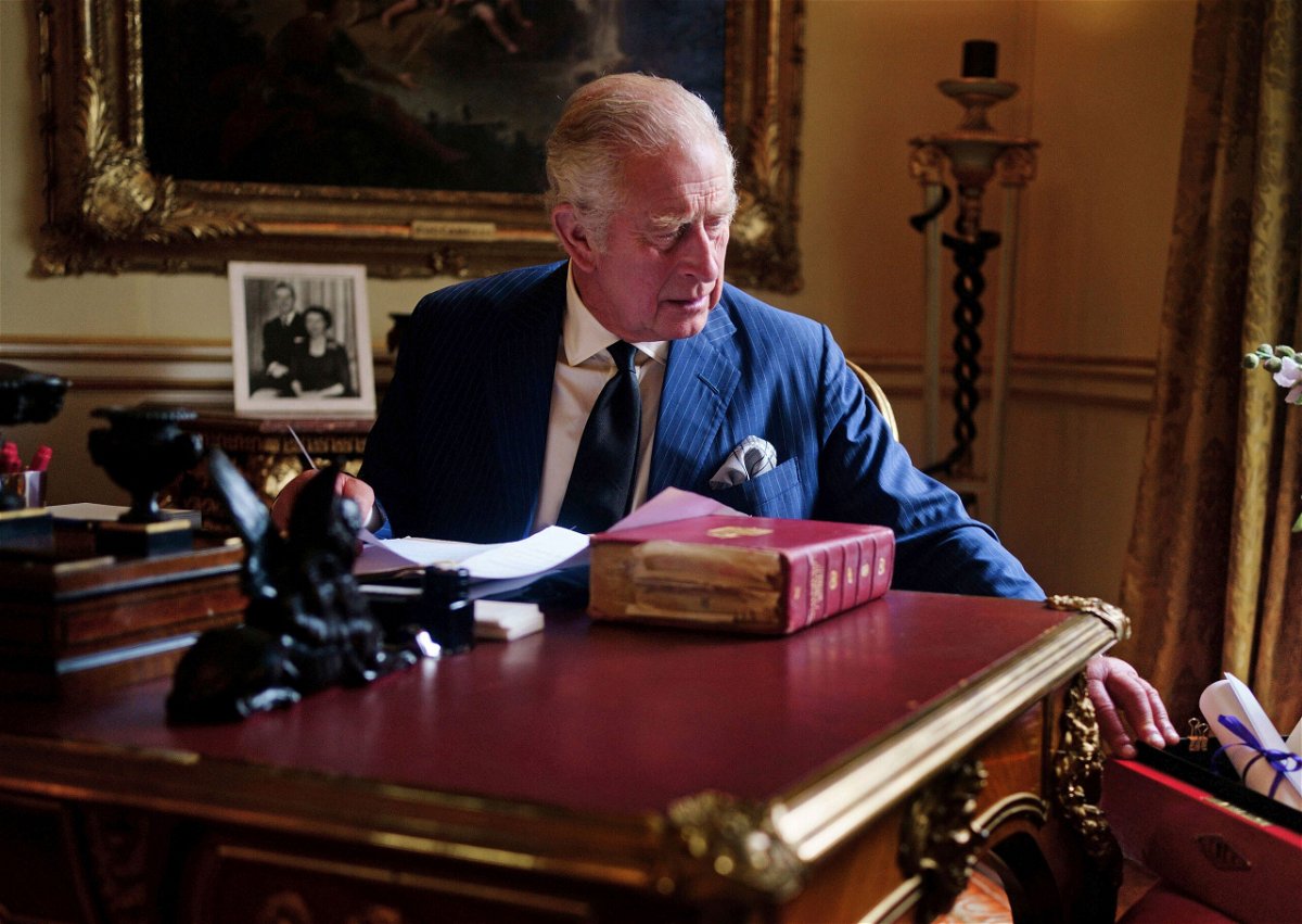 <i>Victoria Jones/PA/AP</i><br/>King Charles III is pictured in September carrying out official government duties at Buckingham Palace.