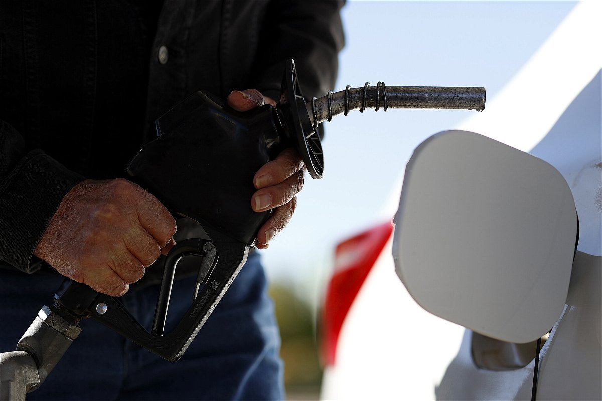 <i>Aaron M. Sprecher/AP</i><br/>Gas prices are on the rise again. A customer fuels up his car at a gas station in Erlanger