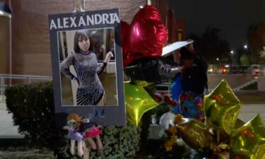 Mourners set up a memorial in honor of Alexandria Bell