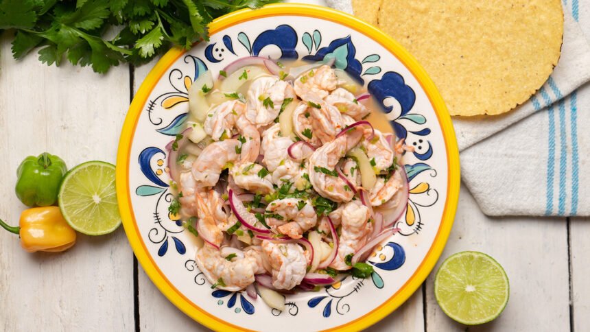 Mexican shrimp raw aguachile on white background