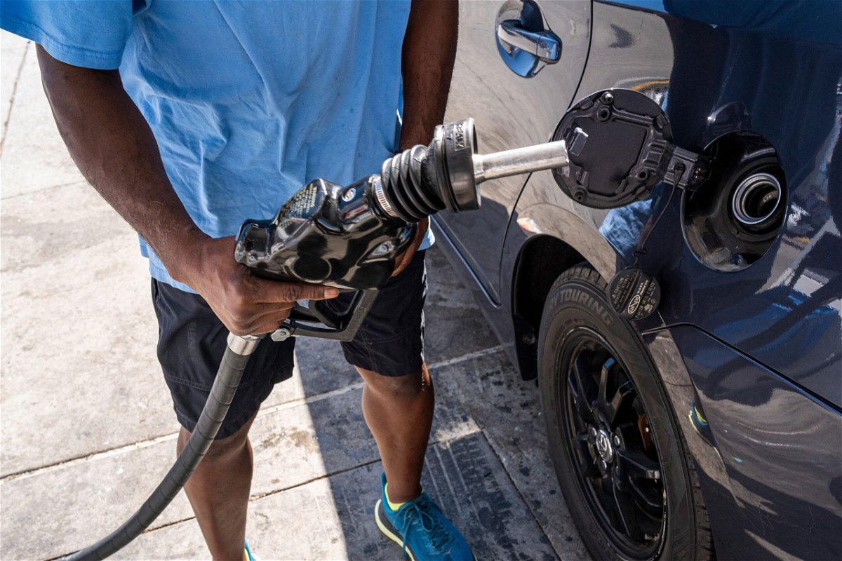 <i>David Paul Morris/Bloomberg/Getty Images</i><br/>A customer refuels at a Chevron gas station in San Francisco