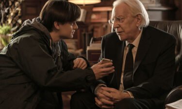Jaeden Martell and Donald Sutherland in the Stephen King adaptation 'Mr. Harrigan's Phone.'