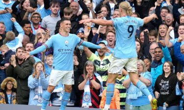 Phil Foden of Manchester City celebrates scoring their sixth goal and also his hat trick with fellow hat trick scorer Erling Haaland of Manchester Cityduring the Premier League match at the Etihad Stadium