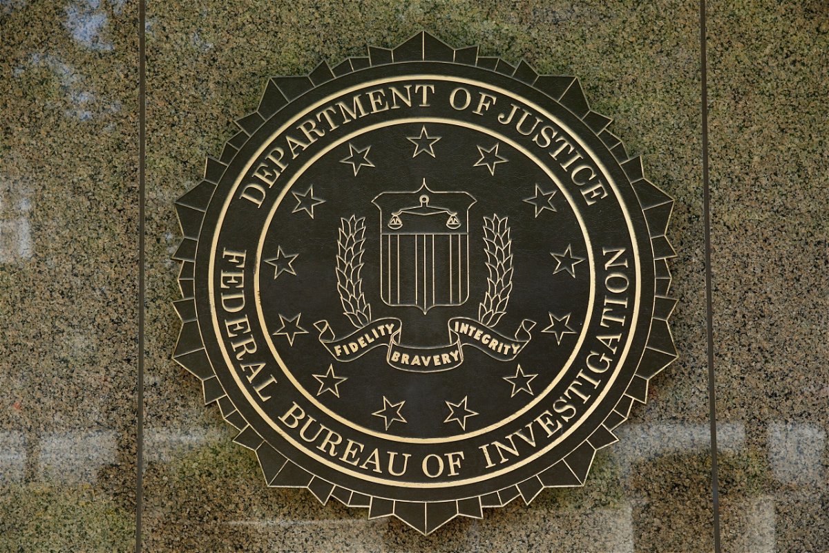 <i>YURI GRIPAS/AFP/AFP via Getty Images</i><br/>The FBI seal is seen outside the headquarters building in Washington