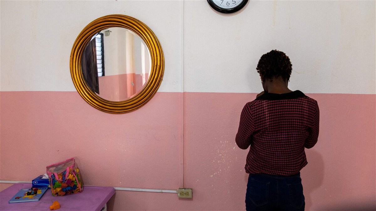 <i>Valerie Baeriswyl/AFP/Getty Images</i><br/>An anonymous victim of sexual abuse poses for a photo at the Doctors Without Borders' 