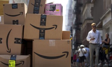 Packages to be delivered on Amazon Prime Day are seen in New York on July 12. Amazon stock fell nearly 20% in after-hours trading on October 27.
