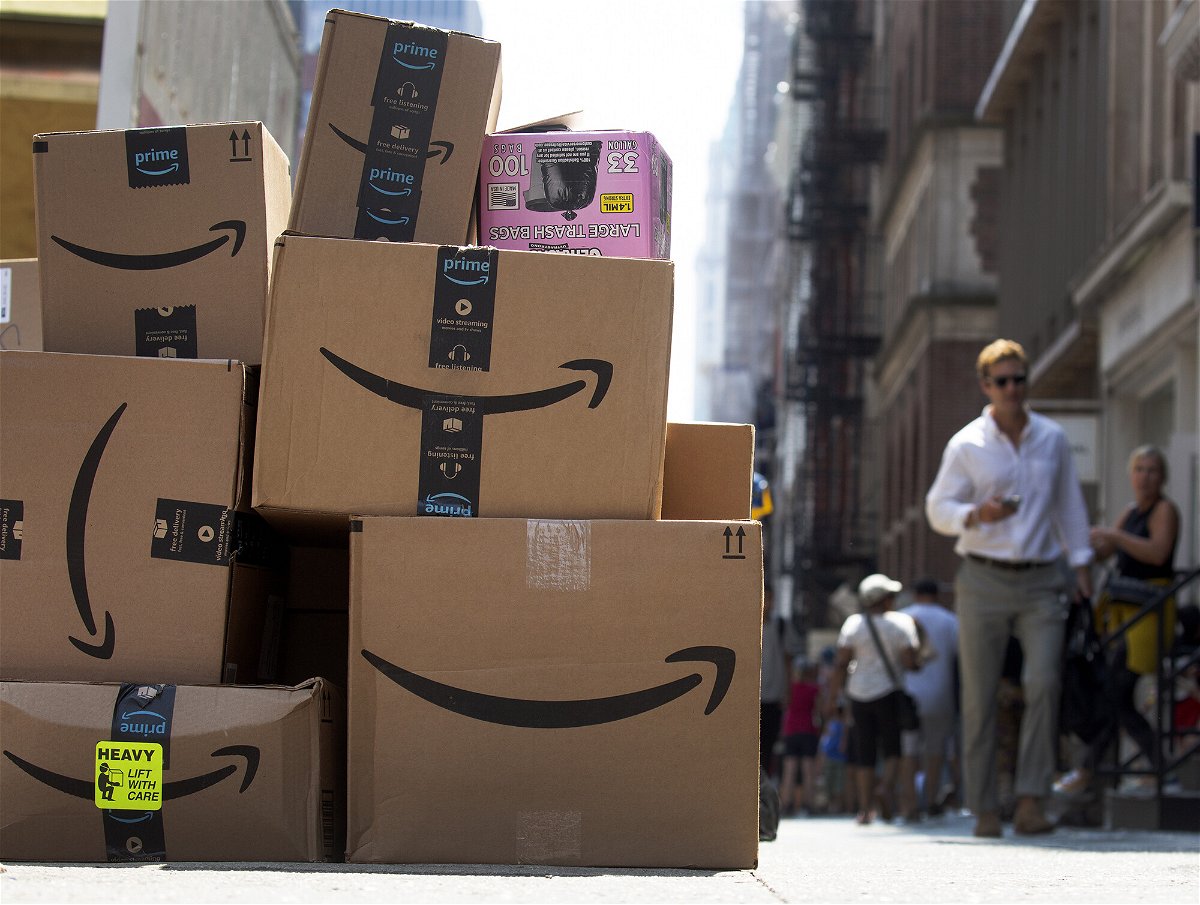 <i>Michael Nagle/Bloomberg/Getty Images</i><br/>Packages to be delivered on Amazon Prime Day are seen in New York on July 12. Amazon stock fell nearly 20% in after-hours trading on October 27.