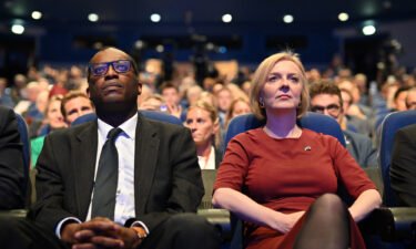 UK Prime Minister Liz Truss (right) has removed her finance minister Kwasi Kwarteng amid widespread speculation that she's getting ready to ditch a big part of her discredited economic strategy. Truss and Kwarteng (left) are seen here in Birmingham